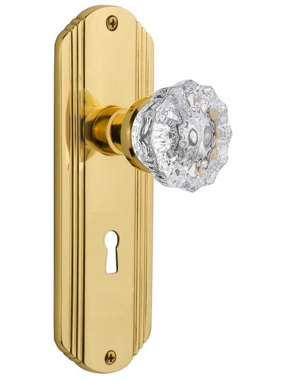 Streamline Deco Door Set With Fluted Crystal Glass Door Knobs in Un-Lacquered Brass .